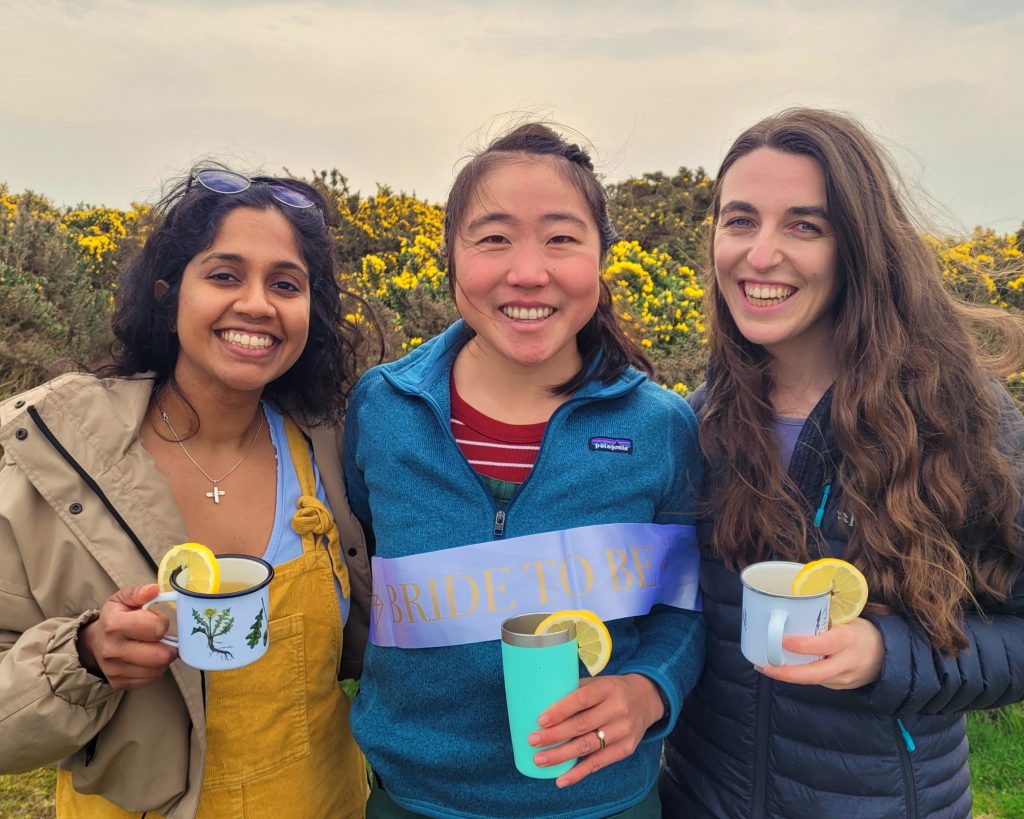 Three women drinking gorse mocktails with gorse
