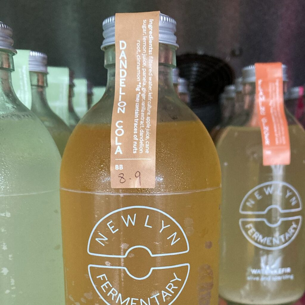 Bottle of dandelion cola at Newlyn Fermentary
