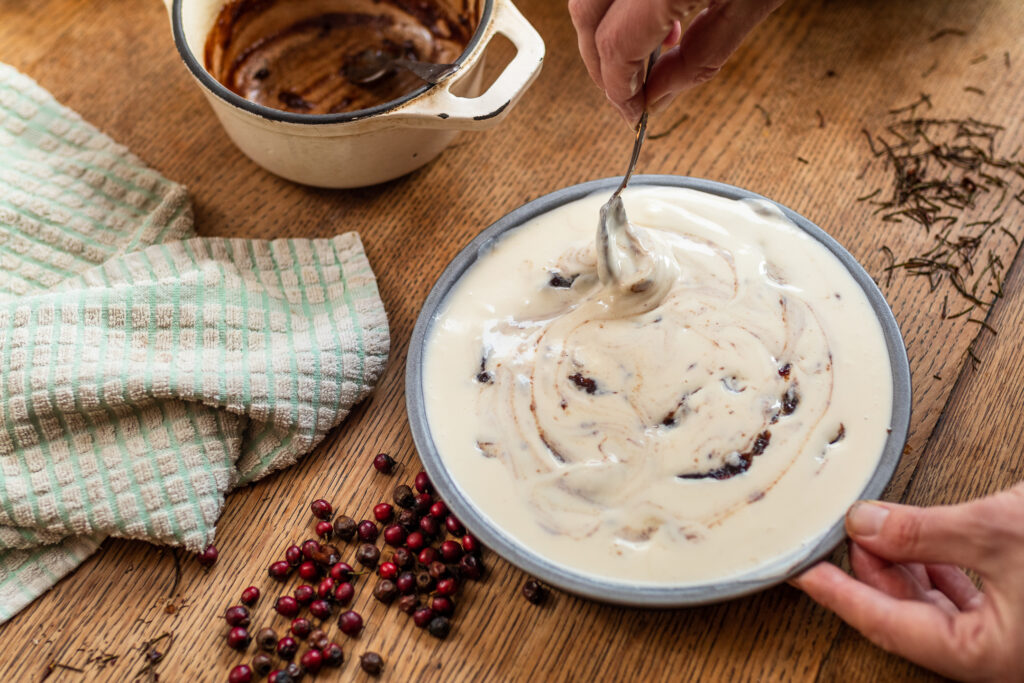 Swirling haw berry jam through the cheesecake topping before baking it
