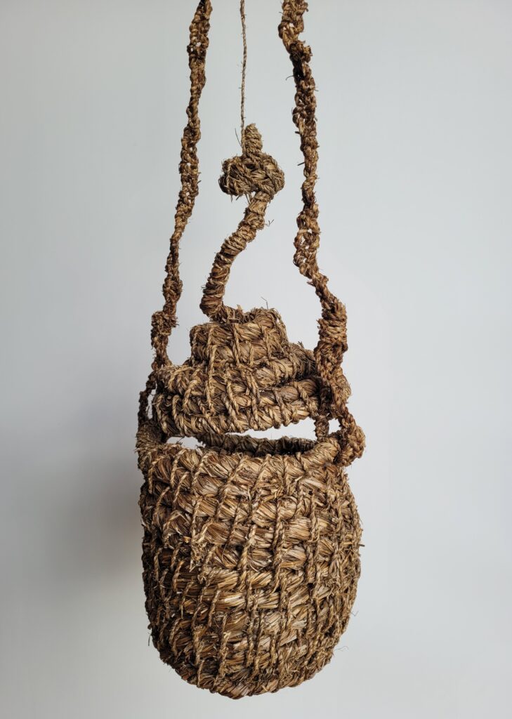 Hanging art vessel with lid