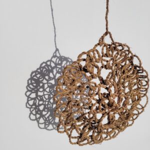 Hanging using nal binding technique with cordyline leaves