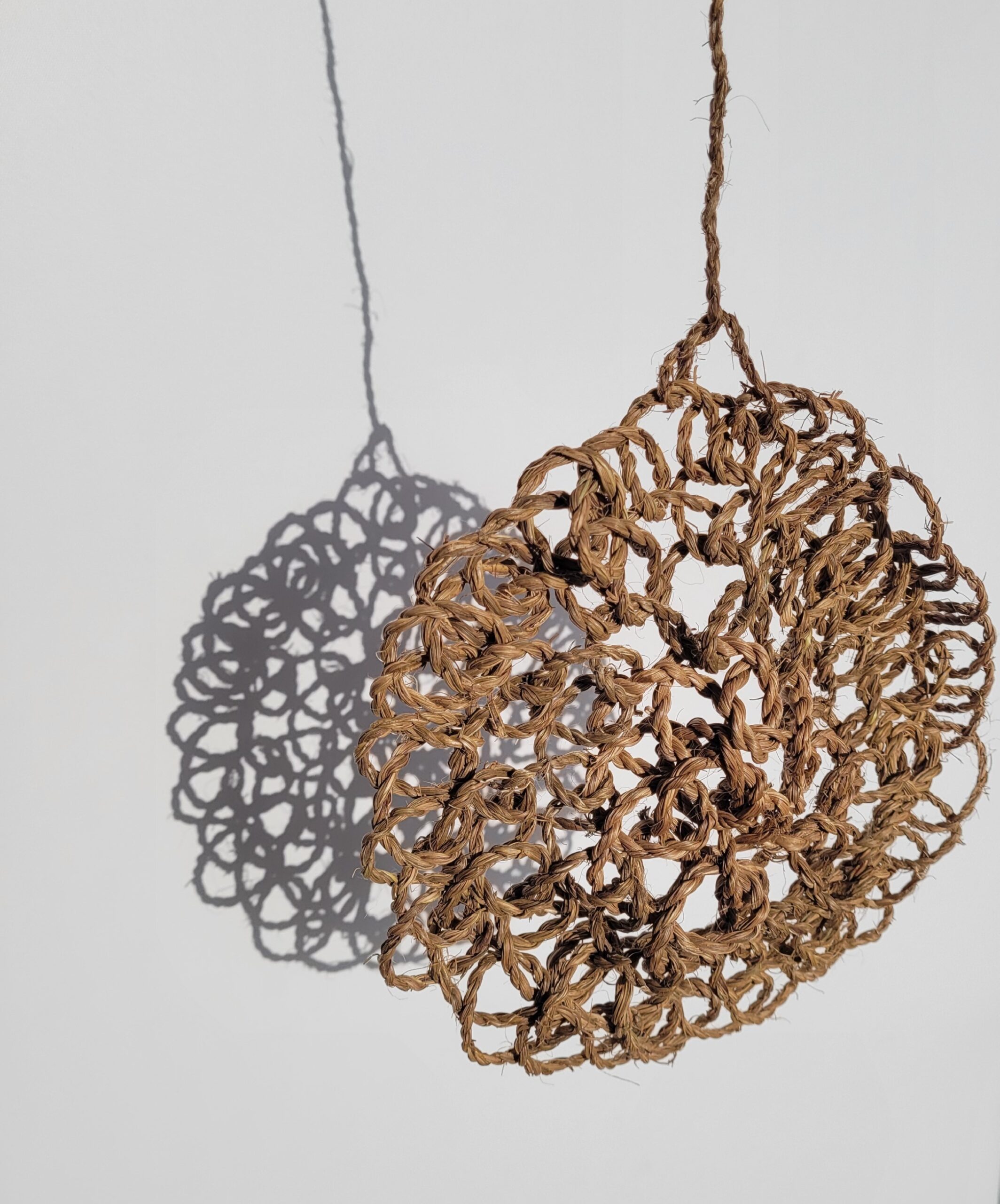 Hanging using nal binding technique with cordyline leaves