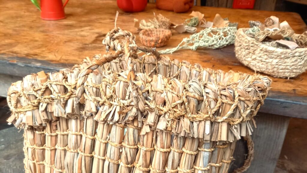 Detail of top part of a kishie basket with unique criss-cross design