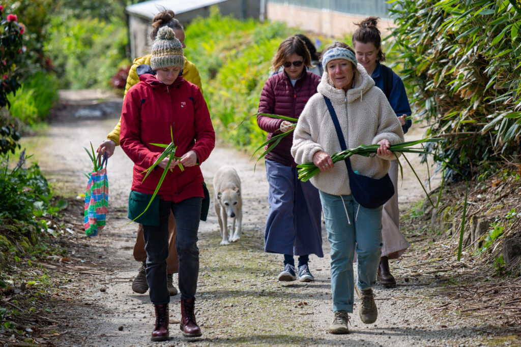 Group of women in Penryn weaving as they walk